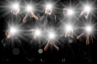 Image of Group of photographers with cameras on black background. Paparazzi taking pictures with flashes