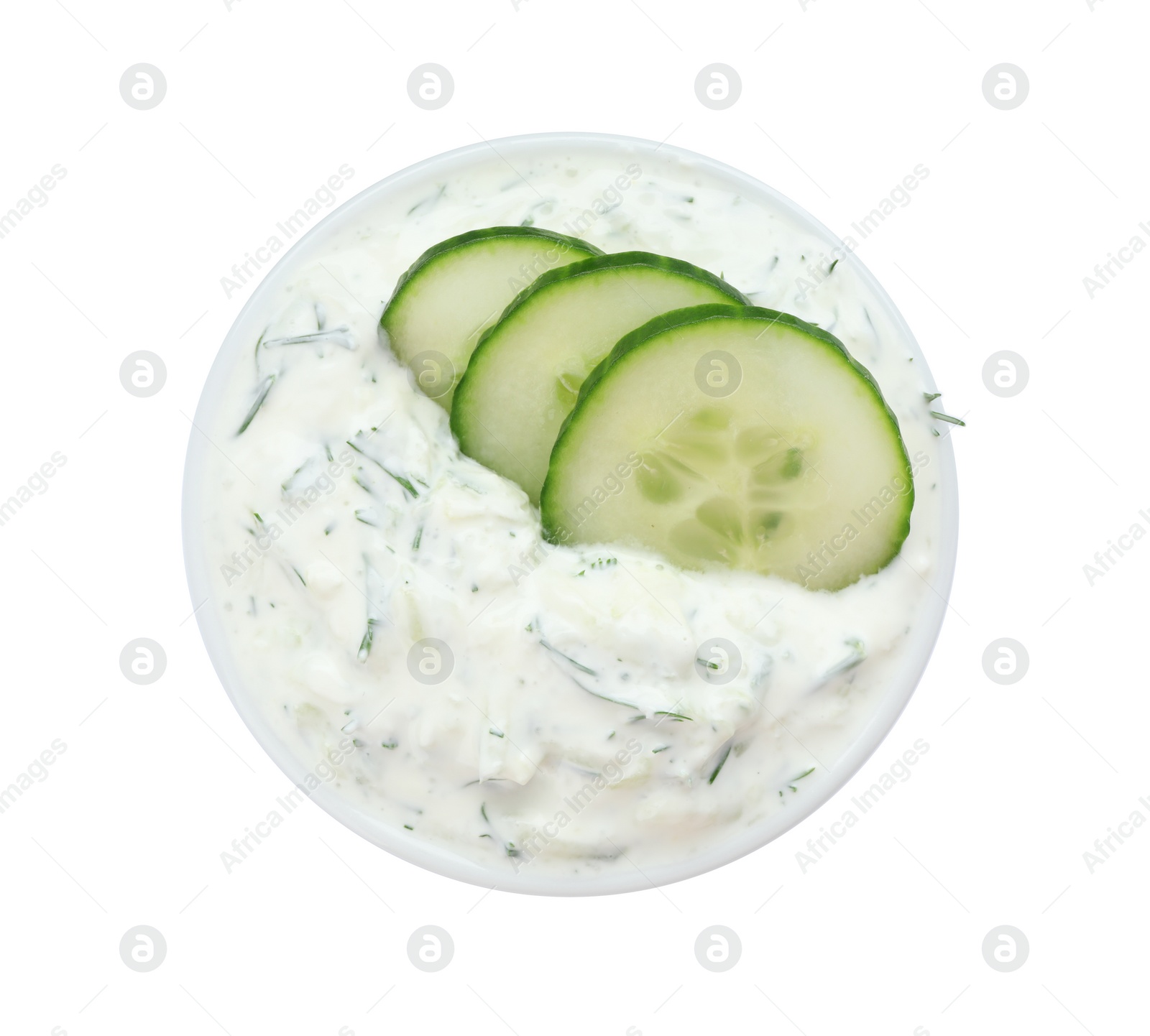 Photo of Bowl with cucumber sauce on white background, top view