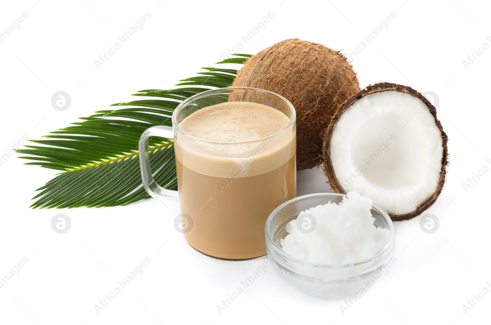 Photo of Delicious coffee with organic coconut oil and palm leaf isolated on white