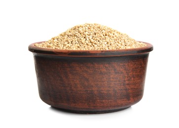 Bowl with raw quinoa on white background