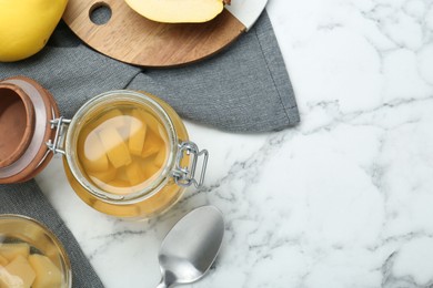 Delicious quince drink and fresh fruits on white marble table, flat lay. Space for text