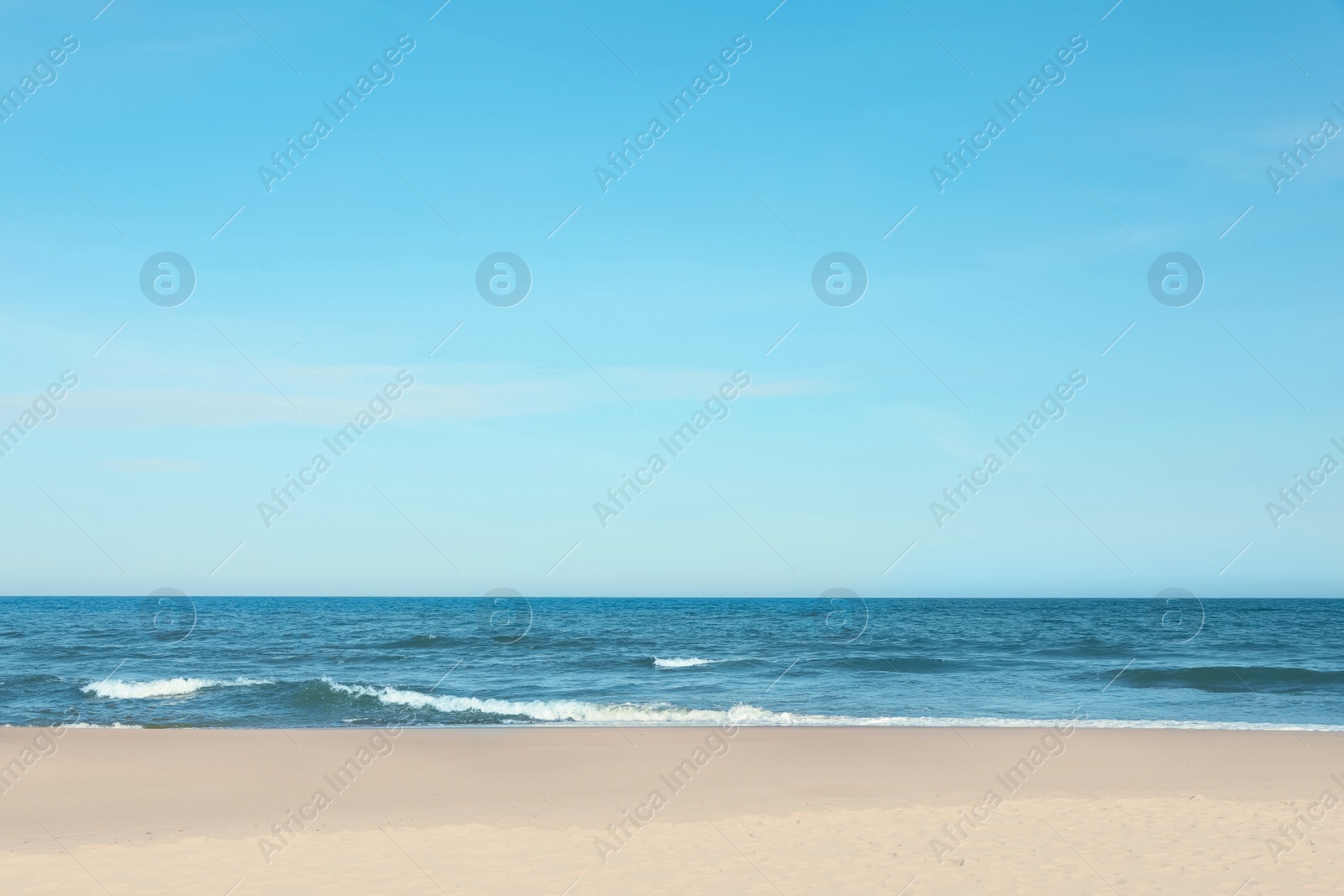 Photo of Picturesque view of beautiful sea and sandy beach on sunny day