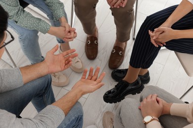 Photo of People at group therapy session indoors, above view