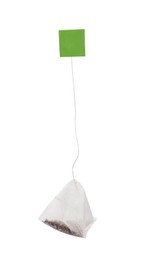 Paper tea bag with tag isolated on white