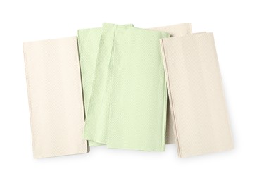 Photo of Many paper napkins on white background, top view