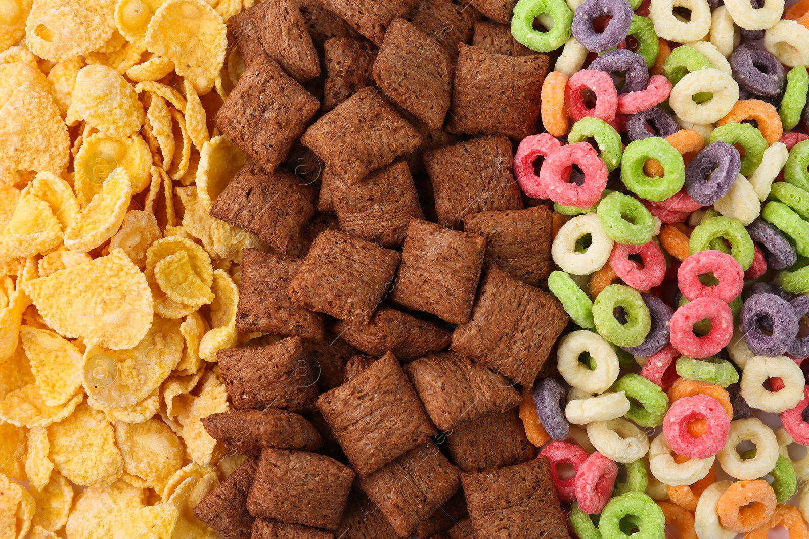 Photo of Different types of dry breakfast as background, top view