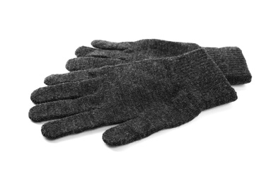 Photo of Grey woolen gloves on white background. Winter clothes