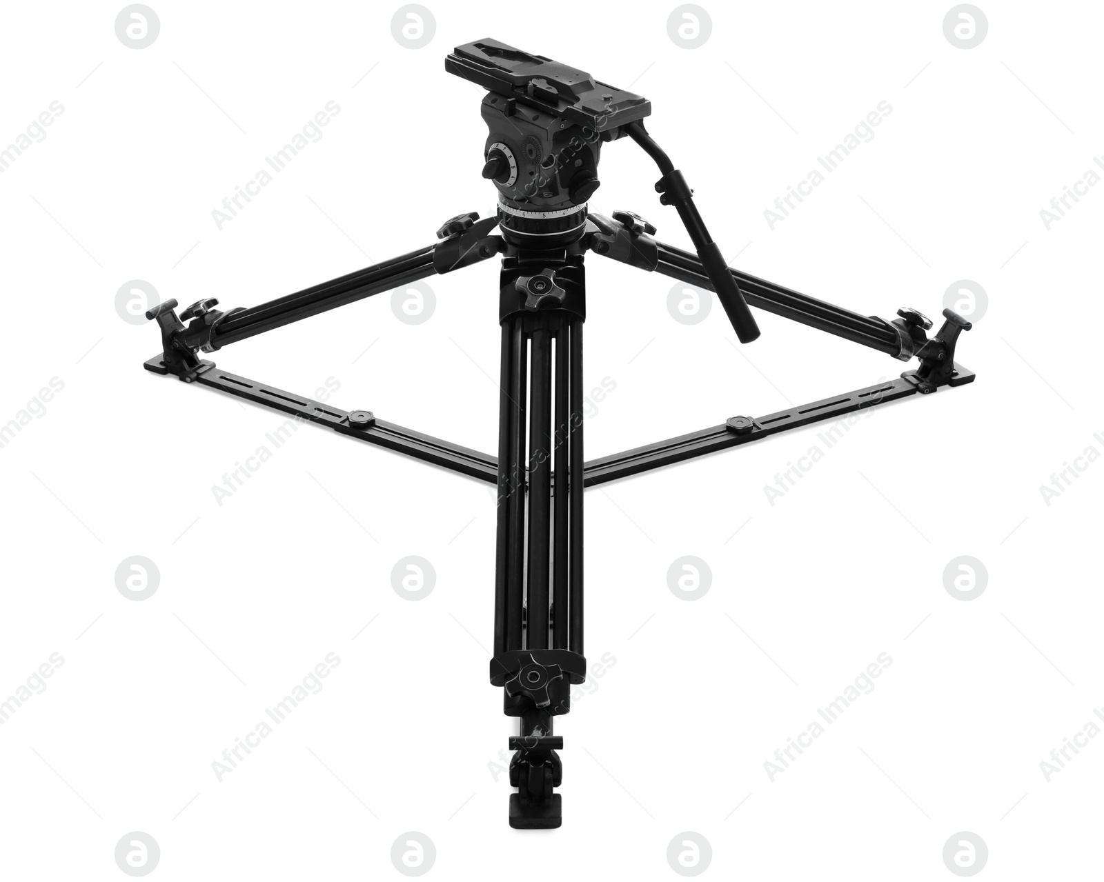 Photo of Modern tripod for video camera isolated on white