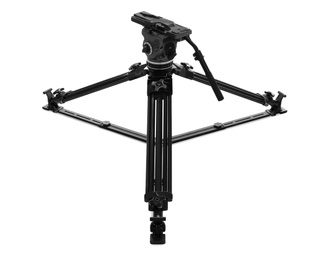 Modern tripod for video camera isolated on white