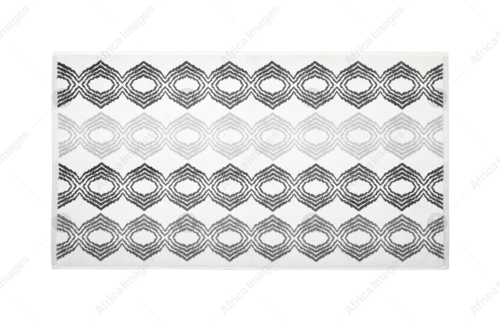 Photo of Soft bath mat with pattern isolated on white, top view