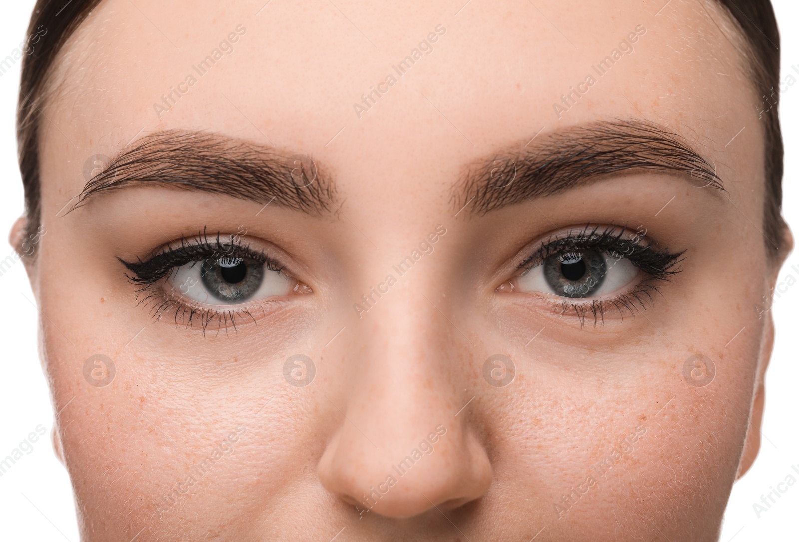 Photo of Makeup product. Woman with black eyeliner and beautiful eyebrows on white background, closeup