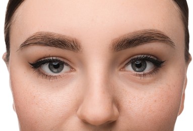 Makeup product. Woman with black eyeliner and beautiful eyebrows on white background, closeup