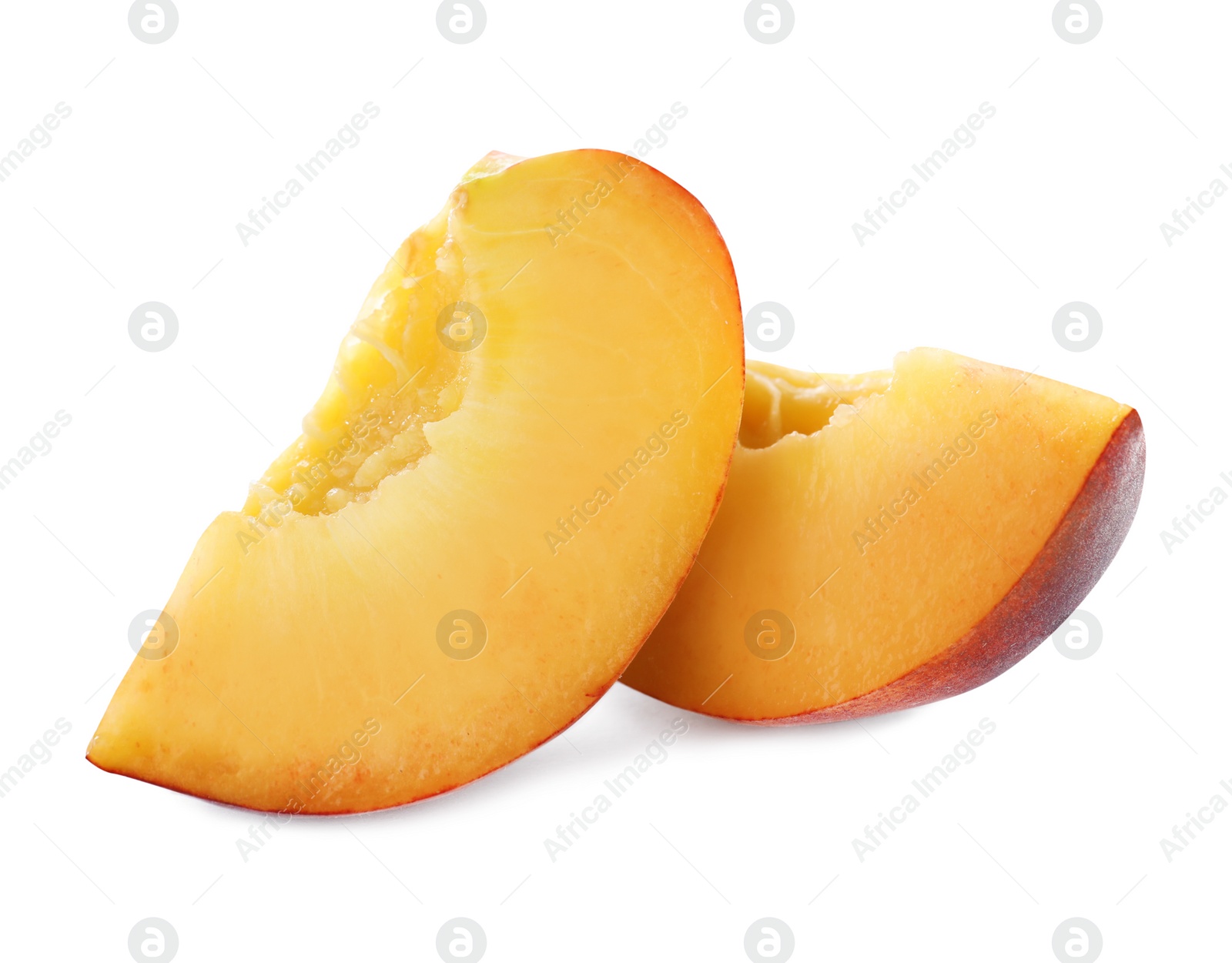 Photo of Slices of sweet juicy peach on white background