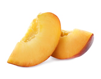 Photo of Slices of sweet juicy peach on white background