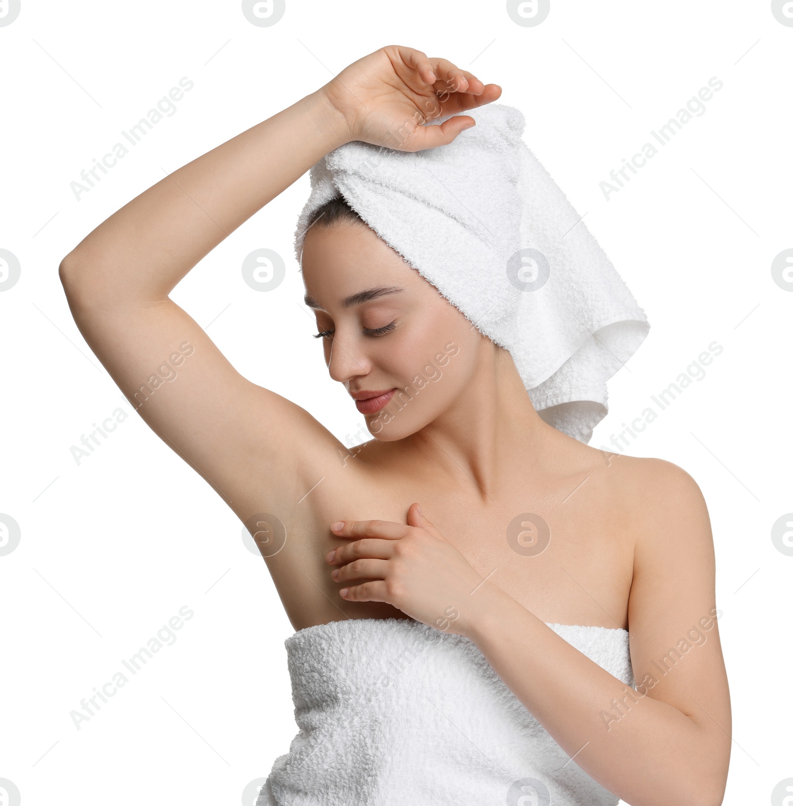 Photo of Beautiful woman showing armpit with smooth clean skin on white background