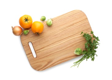 Wooden cutting board with different fresh vegetables isolated on white, top view