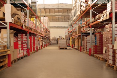 Image of Warehouse with lots of boxes on racks. Wholesale business