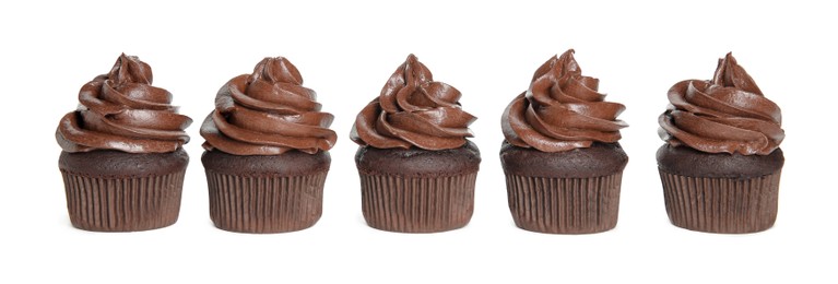 Photo of Delicious chocolate cupcakes with cream on white background