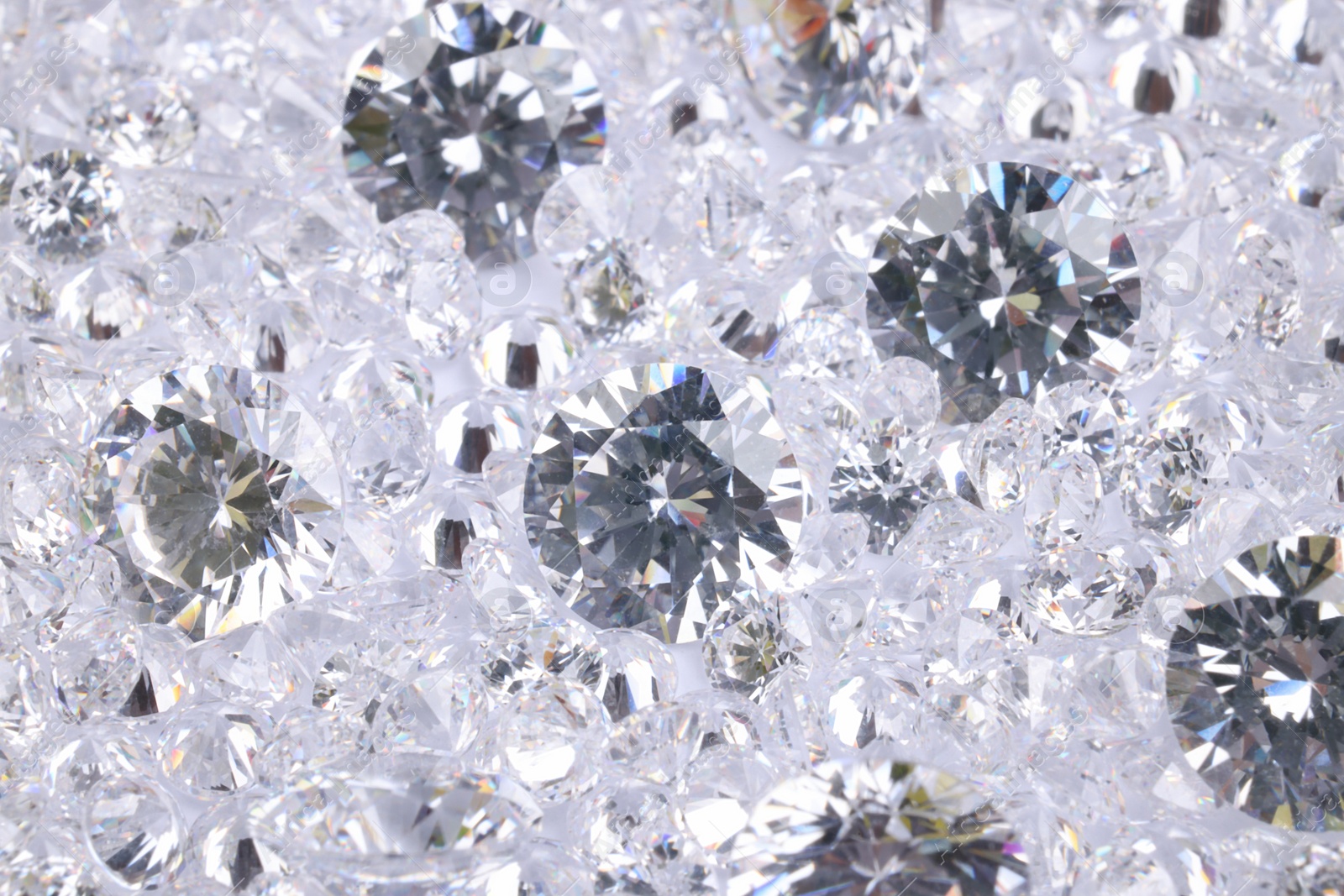 Photo of Many beautiful shiny diamonds as background, closeup