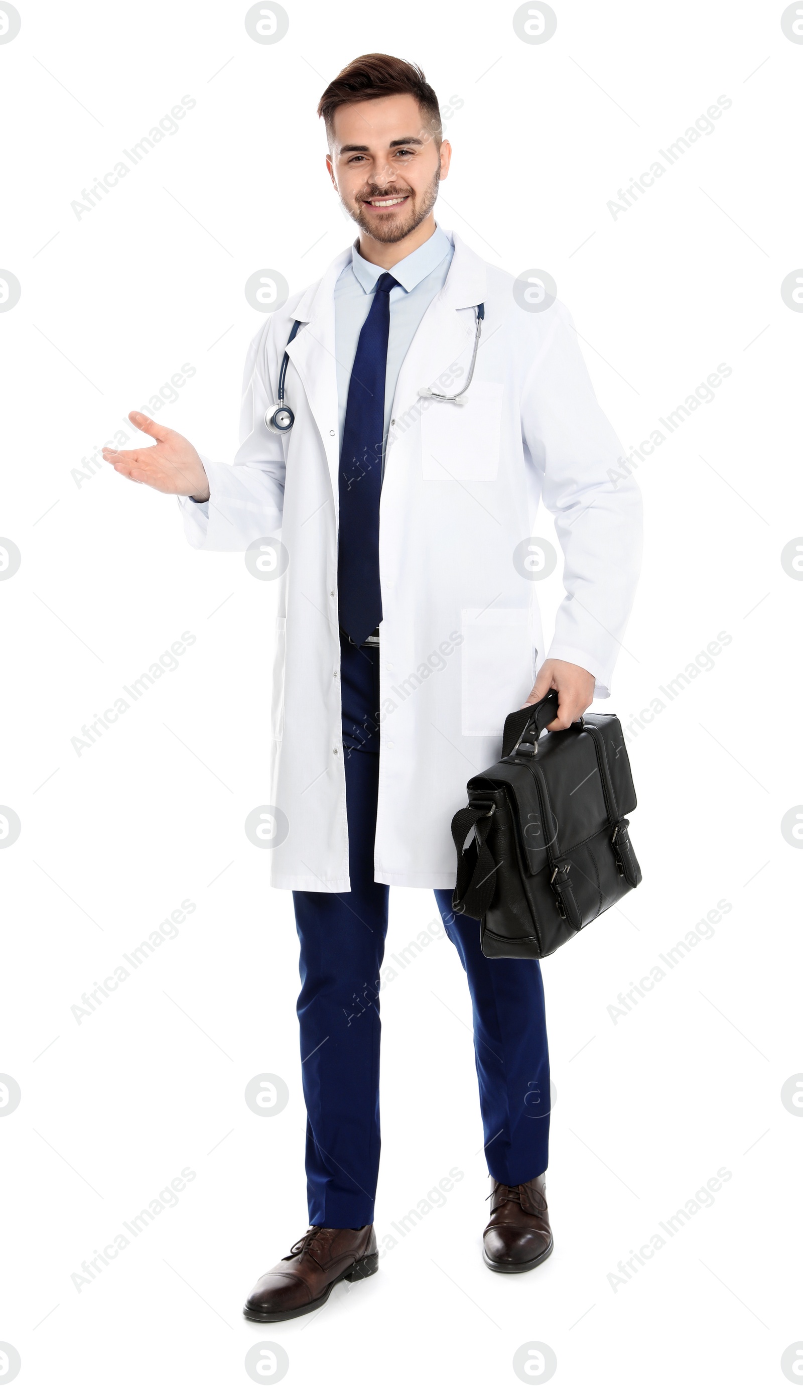 Photo of Full length portrait of medical doctor with bag isolated on white