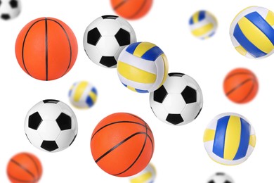 Image of Many balls for different sports flying on white background