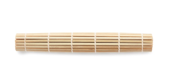 Photo of Rolled sushi mat made of bamboo on white background, top view