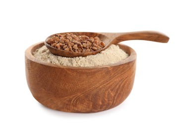 Bowl with flour and spoon of buckwheat on white background