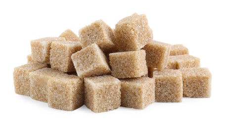 Photo of Many brown sugar cubes isolated on white