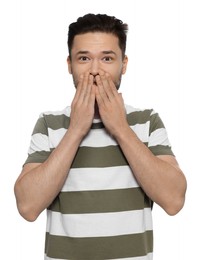 Photo of Embarrassed man covering mouth with hands on white background