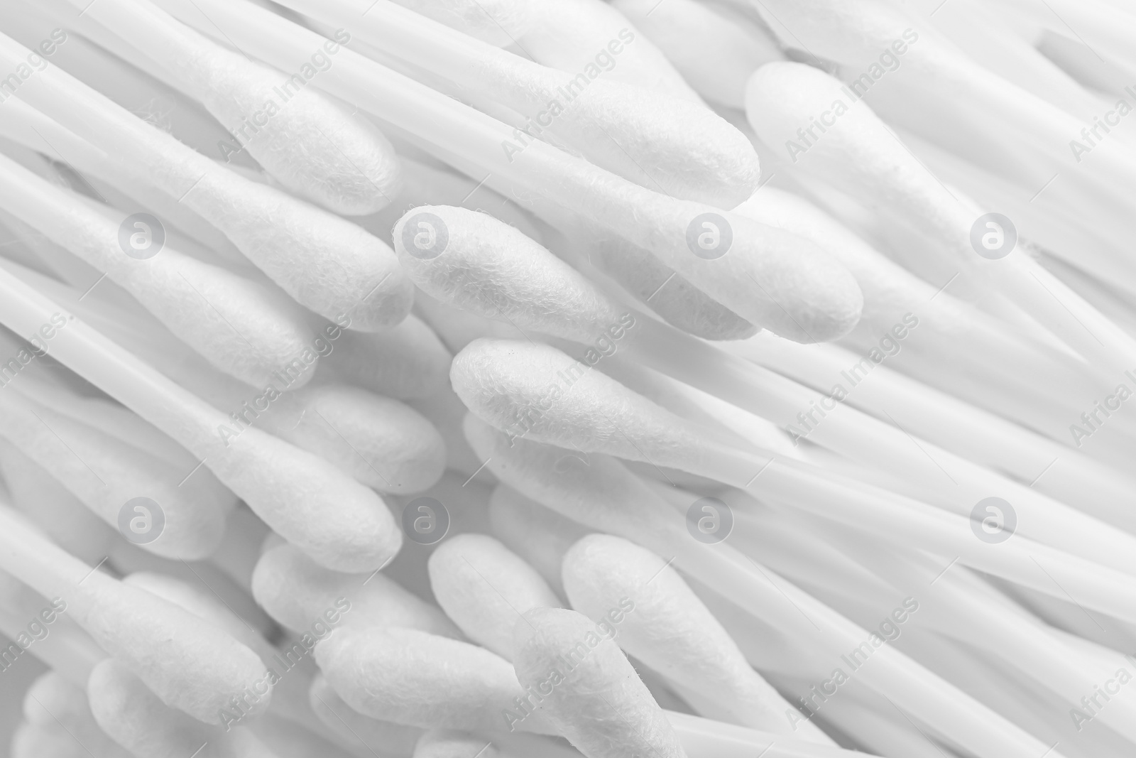 Photo of Many cotton buds as background, closeup view