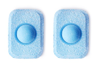 Water softener tablets on white background, top view