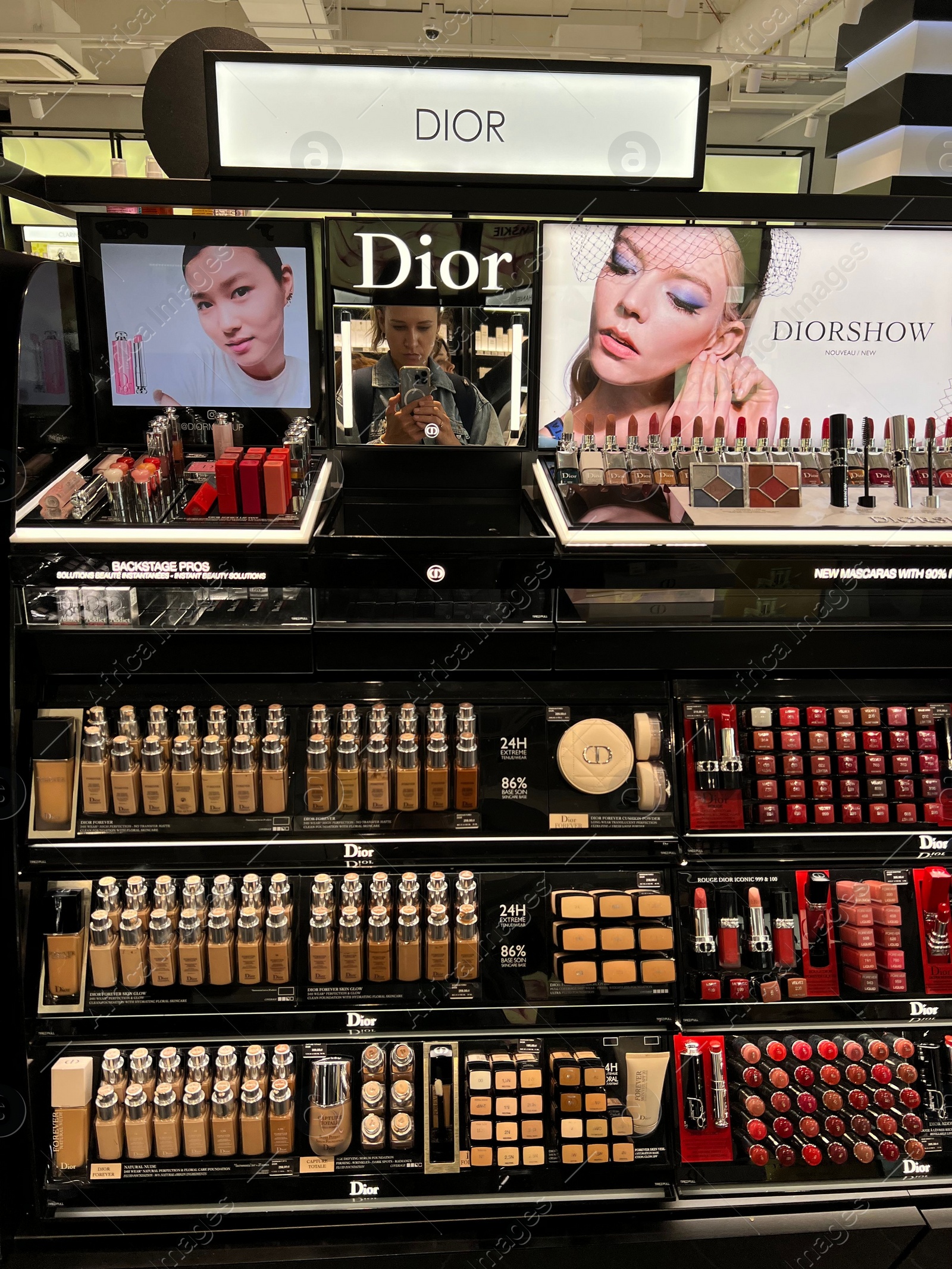 Photo of WARSAW, POLAND - JULY 17, 2022: Cosmetic products on display in Christian Dior retail store