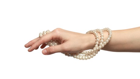 Photo of Young woman with elegant pearl necklace on white background, closeup