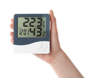 Photo of Woman holding digital hygrometer on white background, closeup