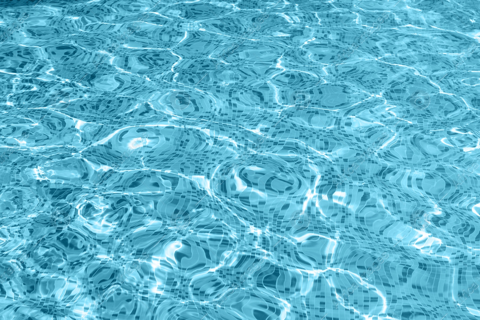 Photo of Rippled water in swimming pool as background