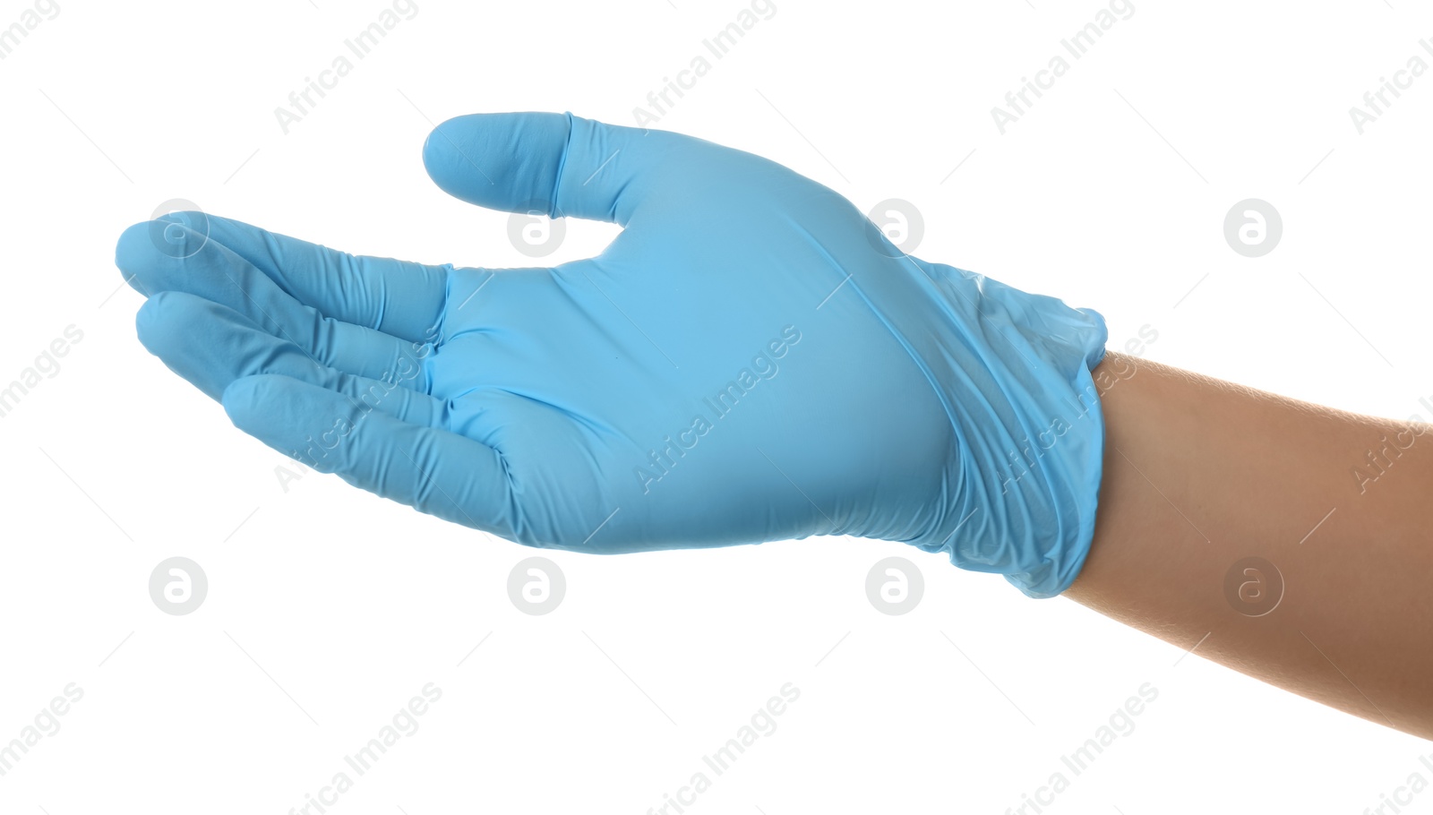 Photo of Person in blue latex gloves holding something against white background, closeup on hand