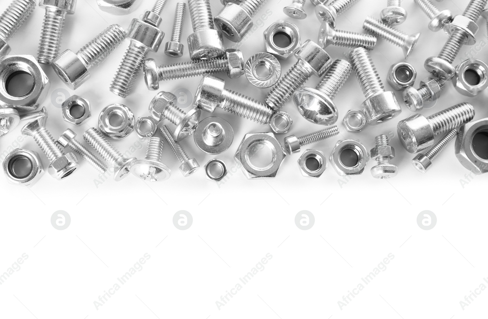 Photo of Different metal bolts and nuts on white background, top view