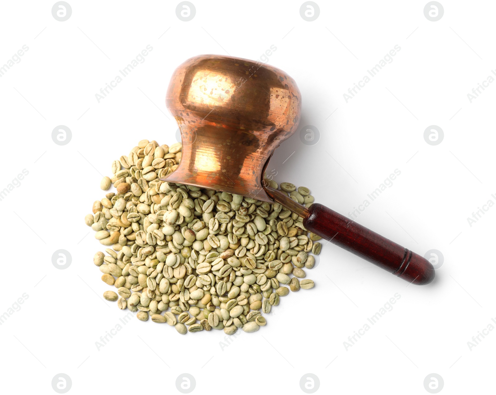 Photo of Overturned jezve with green coffee beans on white background, top view