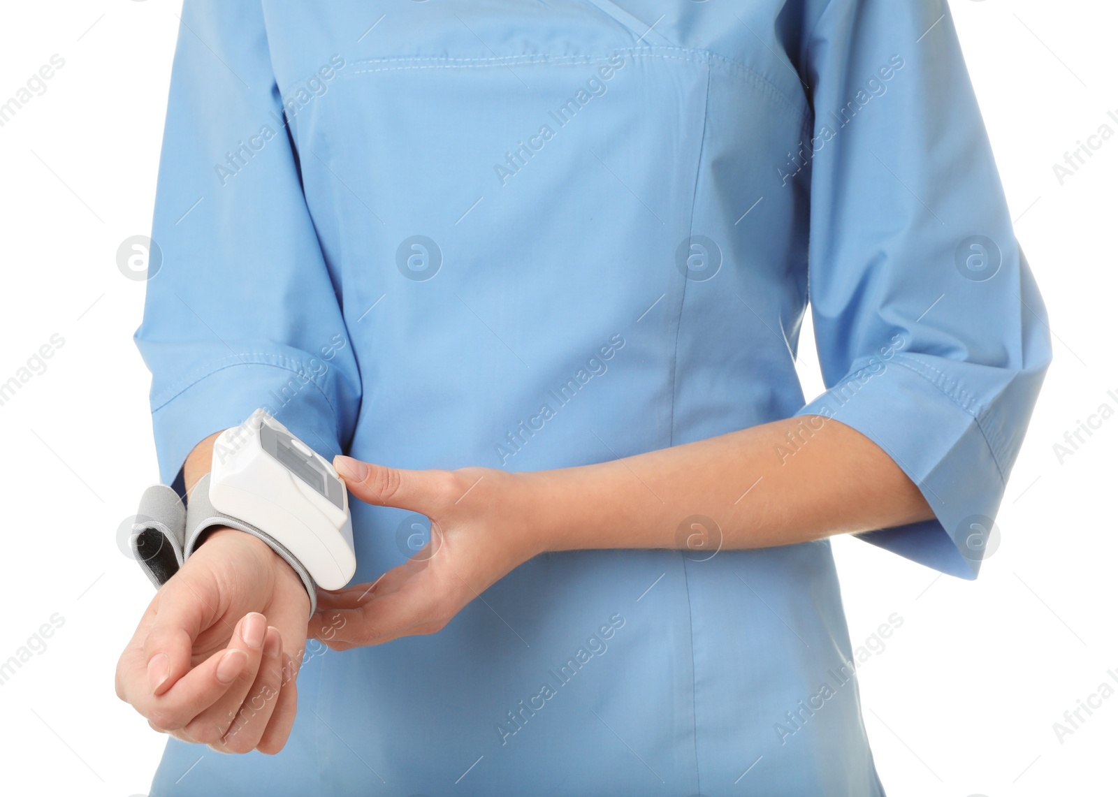 Photo of Female doctor using blood pressure monitor on white background, closeup. Medical object