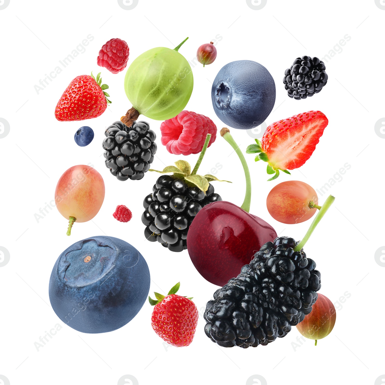 Image of Many different fresh berries falling on white background