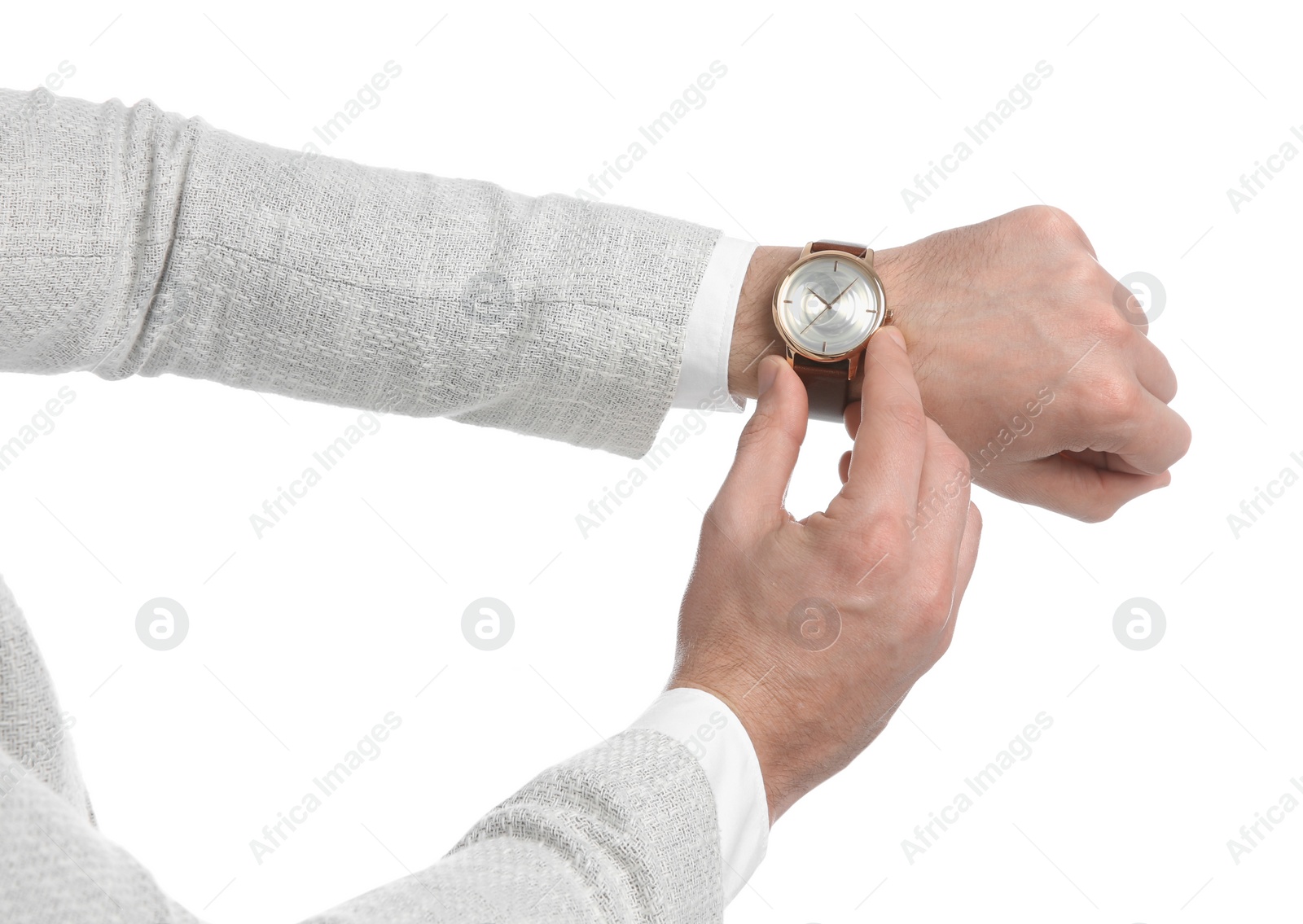 Photo of Businessman wearing wristwatch on white background, closeup. Time management