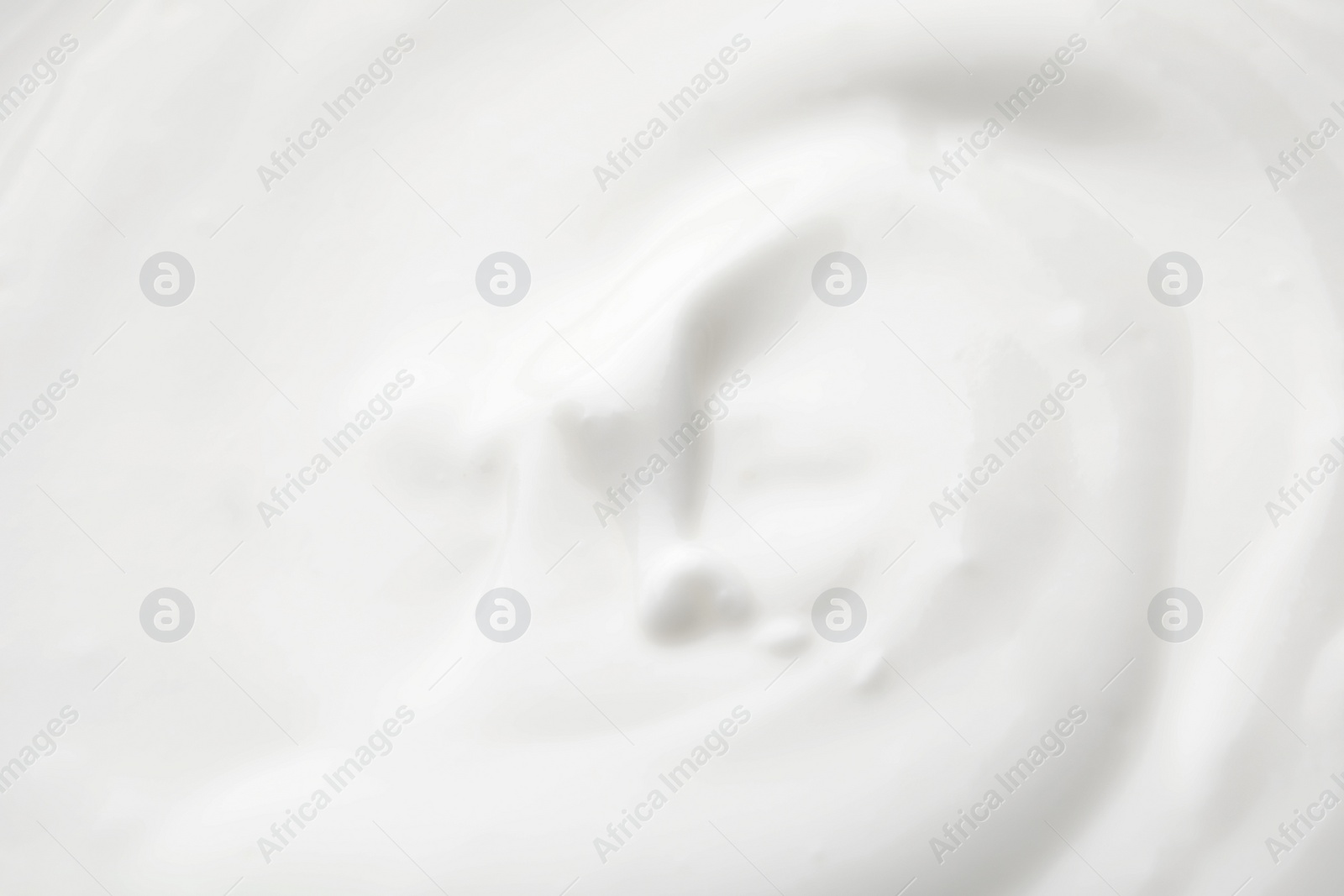 Photo of Delicious creamy yogurt as background, closeup view