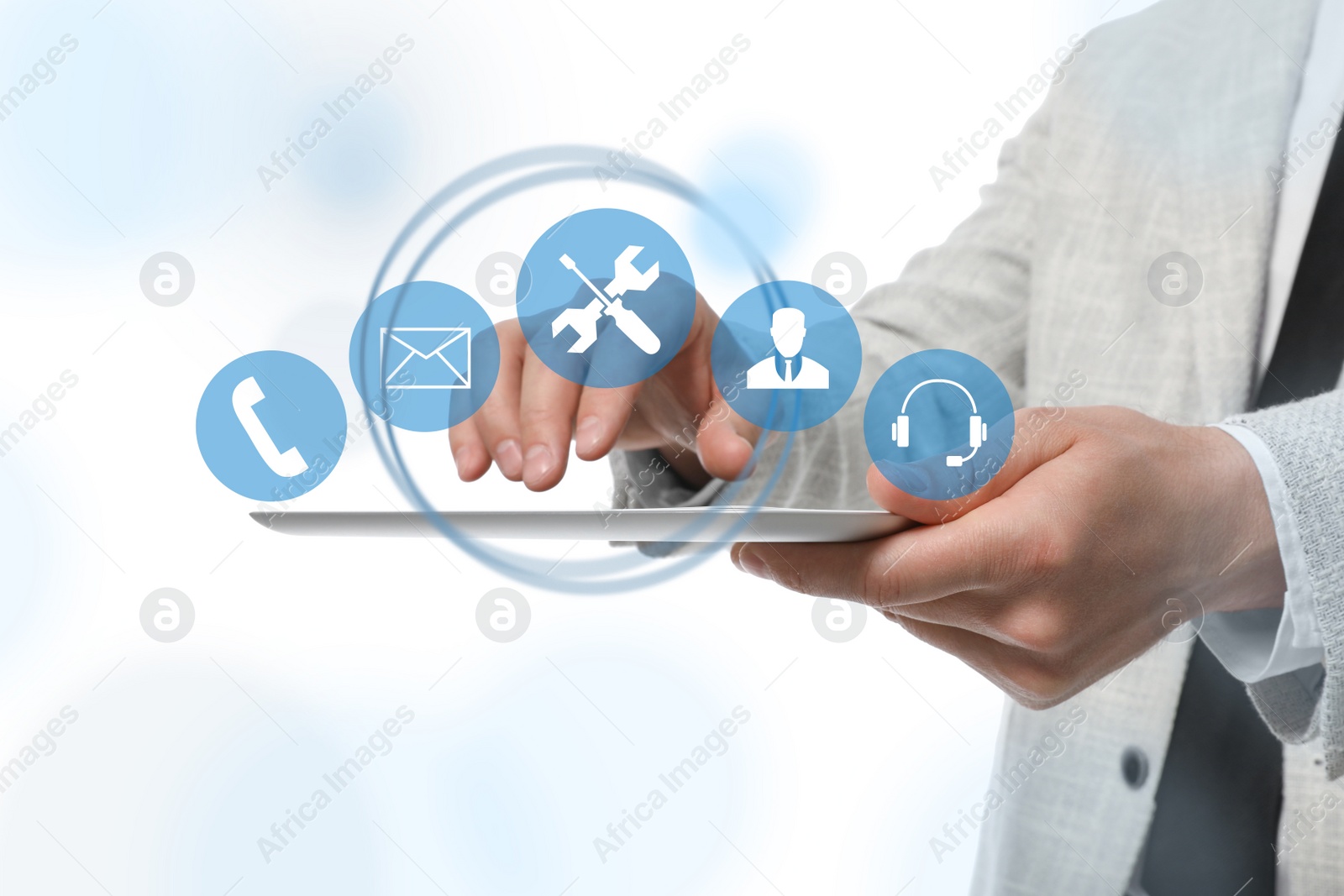 Image of Man using tablet on white background, closeup. Technical support 