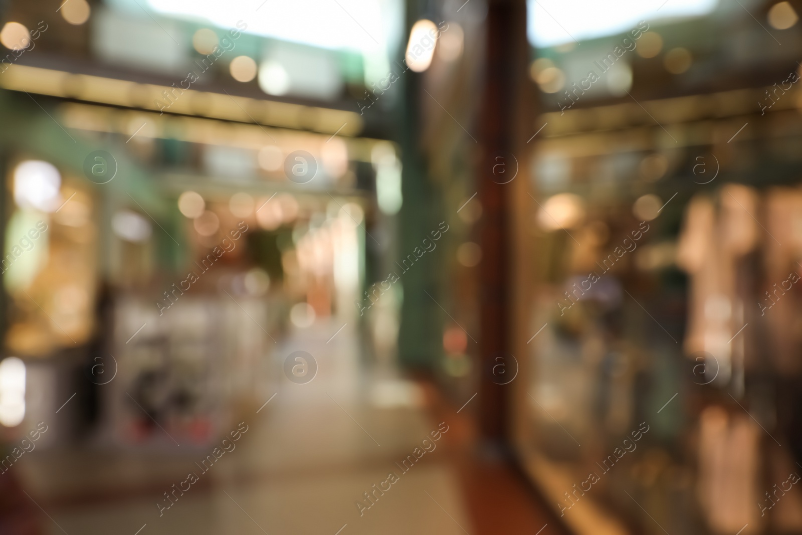 Photo of Blurred view of shopping mall interior. Bokeh effect