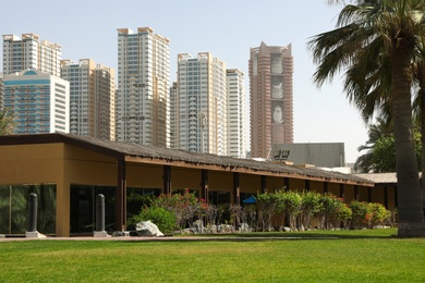 SHARJAH, UNITED ARAB EMIRATES - NOVEMBER 04, 2018: Beautiful landscape with tropical resort on sunny day