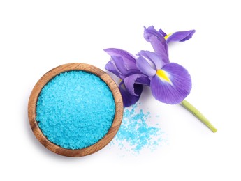 Light blue sea salt in bowl and iris flower isolated on white, top view