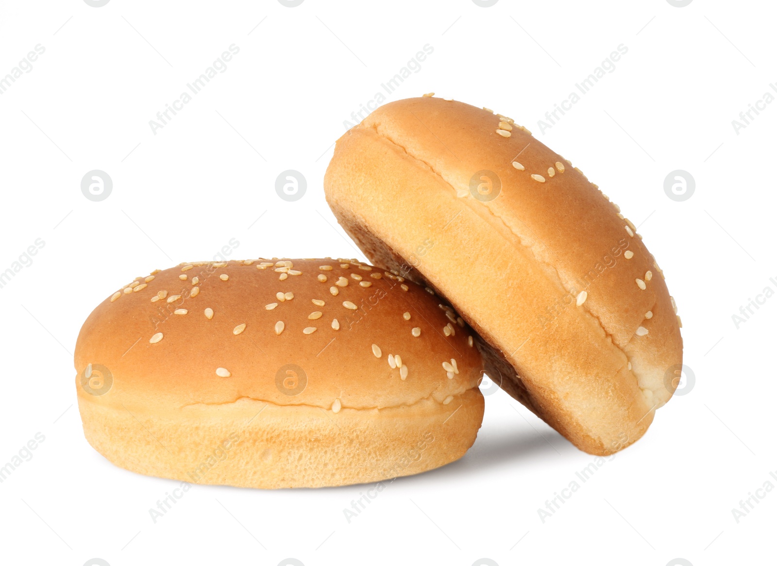 Photo of Two fresh burger buns isolated on white