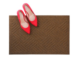 New clean door mat with shoes on white background, top view