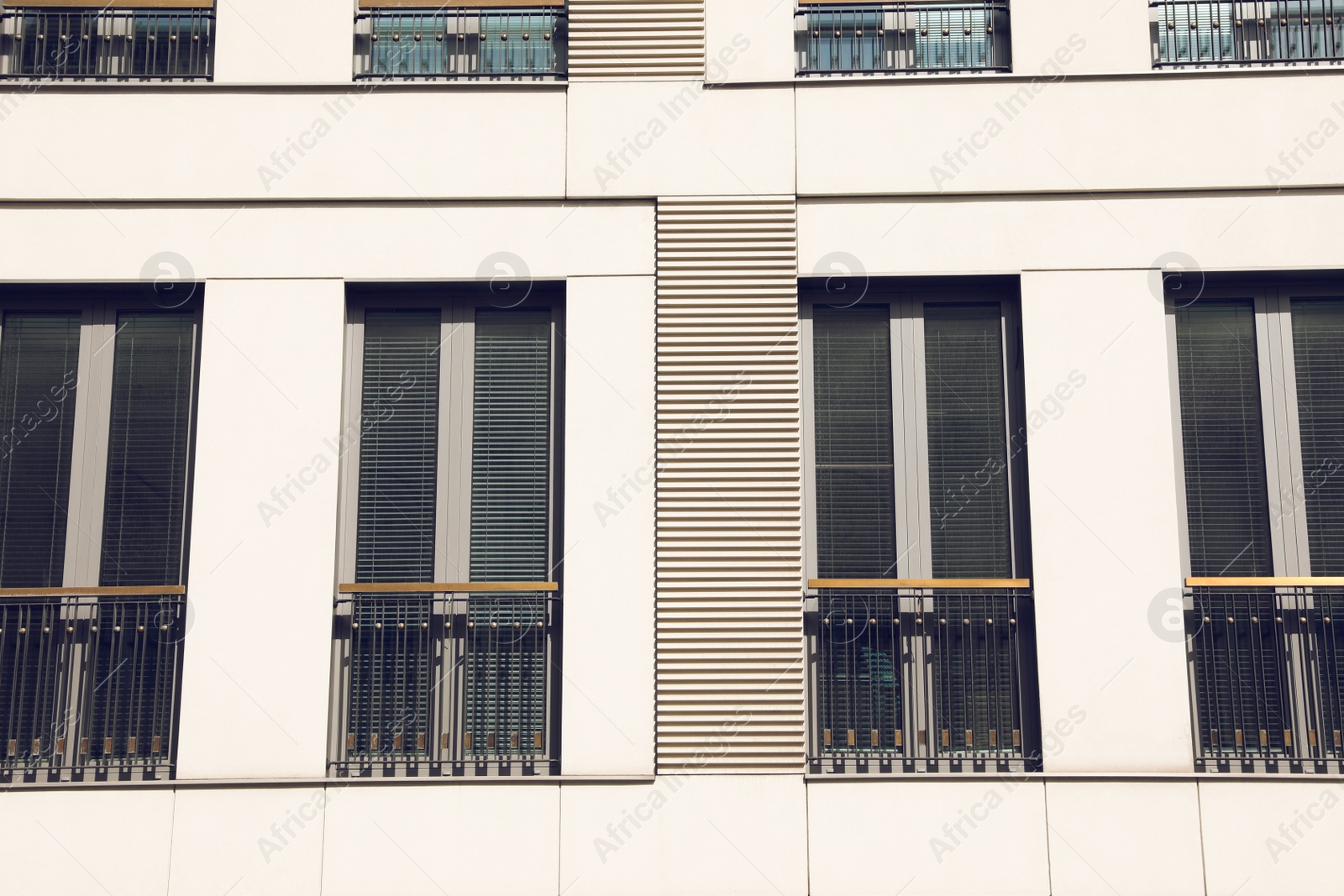 Photo of Big windows with jalousie in building, view from outdoors