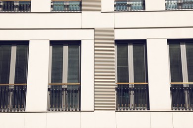 Big windows with jalousie in building, view from outdoors